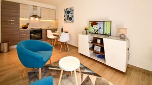 A modern apartment with a kitchen, dining area, and living room. - Vacation home Matea by Interhome (Rijeka)