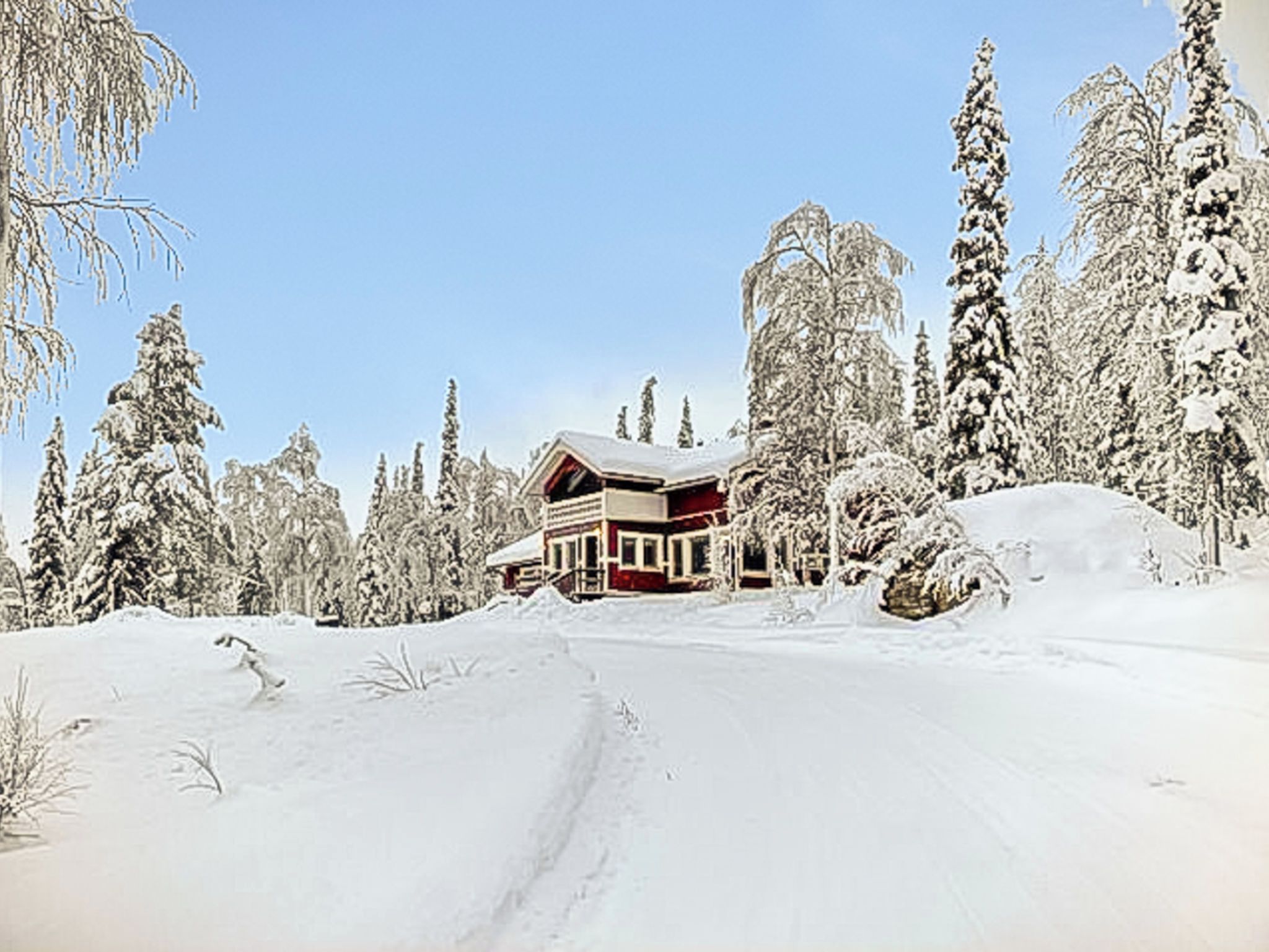 A snow-covered lodge with a red exterior, surrounded by snow-laden trees and a clear sky.