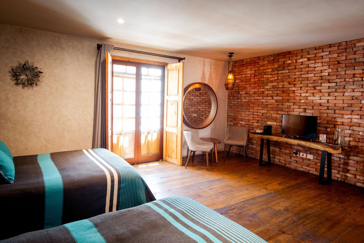 Deluxe Suite | In-room safe, blackout curtains, iron/ironing board (on request)