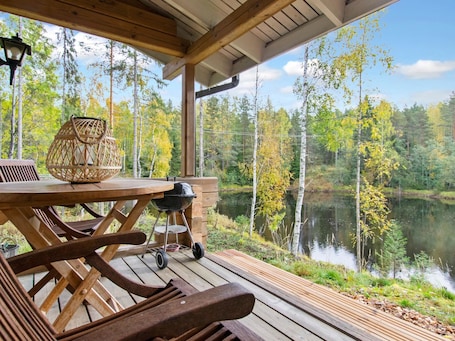 Outdoor dining. Koskimökki, vaikon loma 3 by Interhome