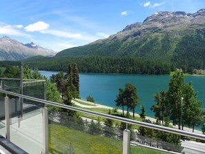 A mountain landscape with a lake, trees, and a clear sky. - Chesa Spuonda Verde 1.7 by Interhome (St. Moritz)