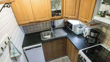 Fridge, microwave, cookware/dishes/utensils