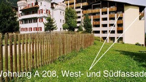A building with a traditional tower and modern apartments. - Disentiserhof Aua Cotschna Avvanzino by Interhome (Disentis)