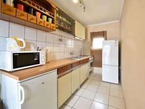 Fridge, microwave, oven, cookware/dishes/utensils