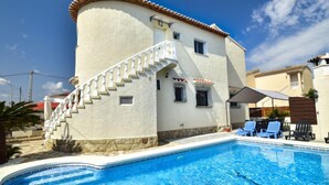 A building with a pool, a staircase, and outdoor seating. - Somnium Mare by Interhome (Dénia)