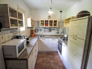 Fridge, microwave, oven, cookware/dishes/utensils