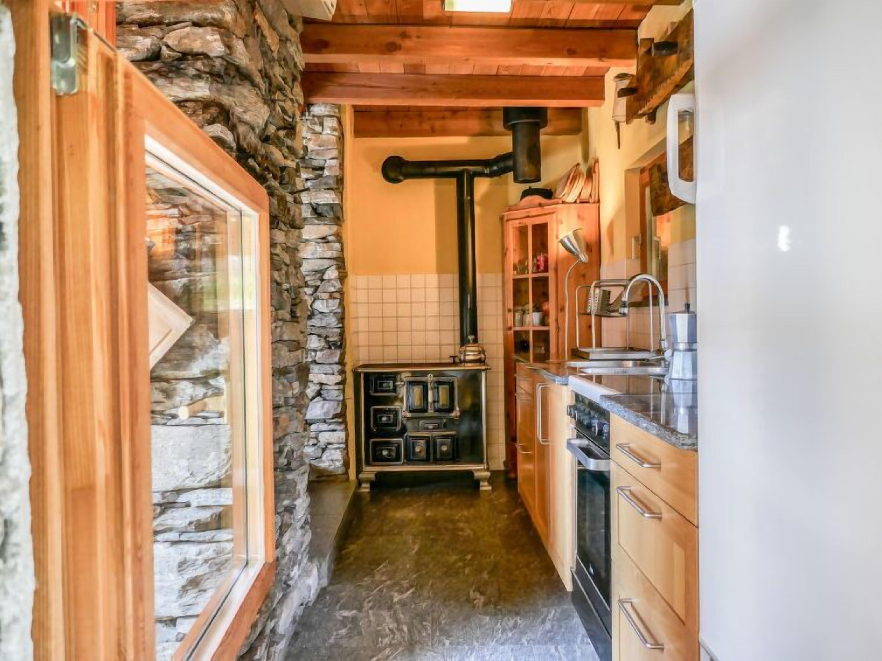 Fridge, oven, high chair, cookware/dishes/utensils