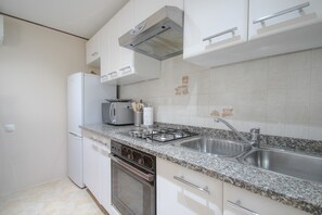 Apartment, Private Pool (Ivana A4) | Private kitchen | Full-size fridge, microwave, oven, stovetop - Ivana (Novigrad)