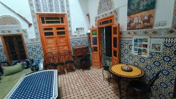 Family Double Room, 1 Bedroom | Living area | 32-inch Smart TV with satellite channels, TV