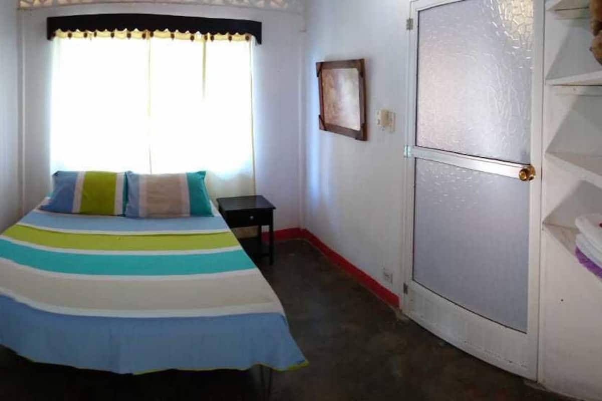 Double Room, Private Bathroom | Iron/ironing board, WiFi (free), bed sheets