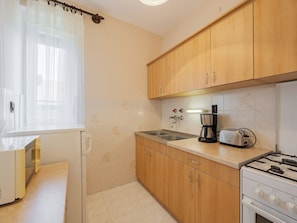 Fridge, microwave, oven, cookware/dishes/utensils