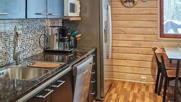 Fridge, microwave, dishwasher, cookware/dishes/utensils