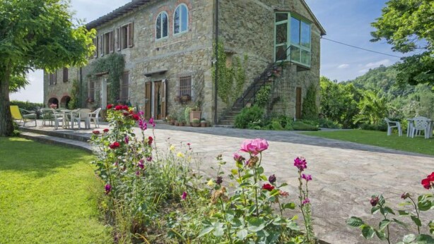 A stone building with a garden and outdoor seating area. - I Noccioli by Interhome (Rufina)