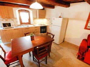 Fridge, microwave, oven, cookware/dishes/utensils