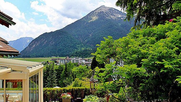 A mountain view with a building in the foreground. - Seekarblick by Interhome (Achenkirch)