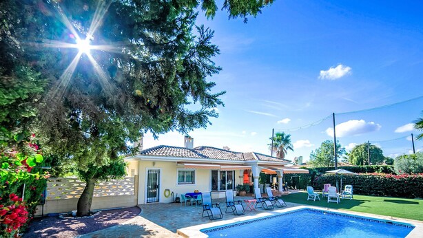 A house with a swimming pool, outdoor seating, and a garden. - Bonalba Golf, Urb. Los Naranjos by Interhome (San Juan / Muchamiel)