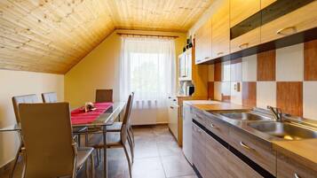 Fridge, microwave, oven, cookware/dishes/utensils