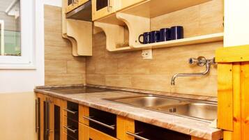 Fridge, microwave, cookware/dishes/utensils