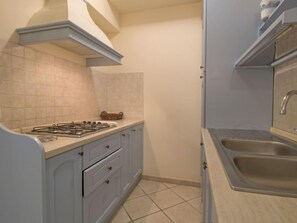 Fridge, microwave, cookware/dishes/utensils