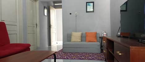 Standard House, 2 Bedrooms | Living area | Flat-screen TV