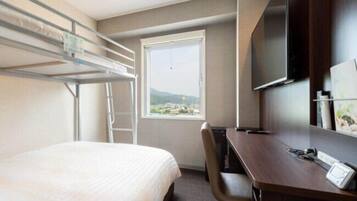 Desk, blackout curtains, free WiFi, bed sheets