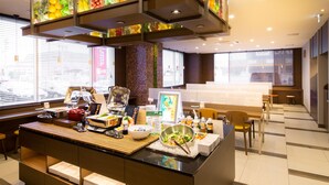 A buffet area with a variety of food items and a salad bar. - Super Hotel Ehime Ozu Inter (Ozu)
