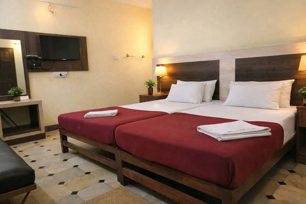 Familierom, fjellutsikt | Sengetøy av topp kvalitet og senger med overmadrass