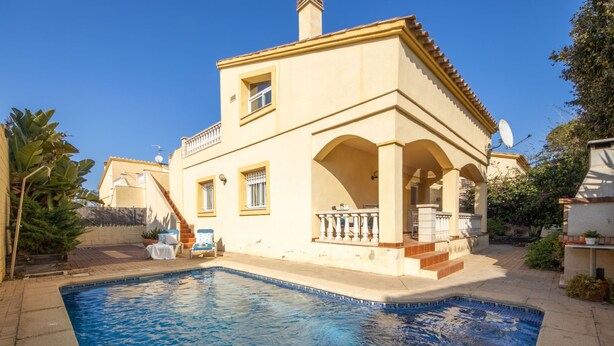 A two-story house with a swimming pool in the foreground. - Vacation home Sally by Interhome (Deltebre)