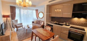 Royal Apartment, 1 Bedroom | Living area | 43-inch LED TV with satellite channels, TV - Leylak Suite (Istanbul)
