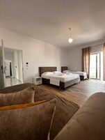 Premium bedding, desk, blackout curtains, soundproofing