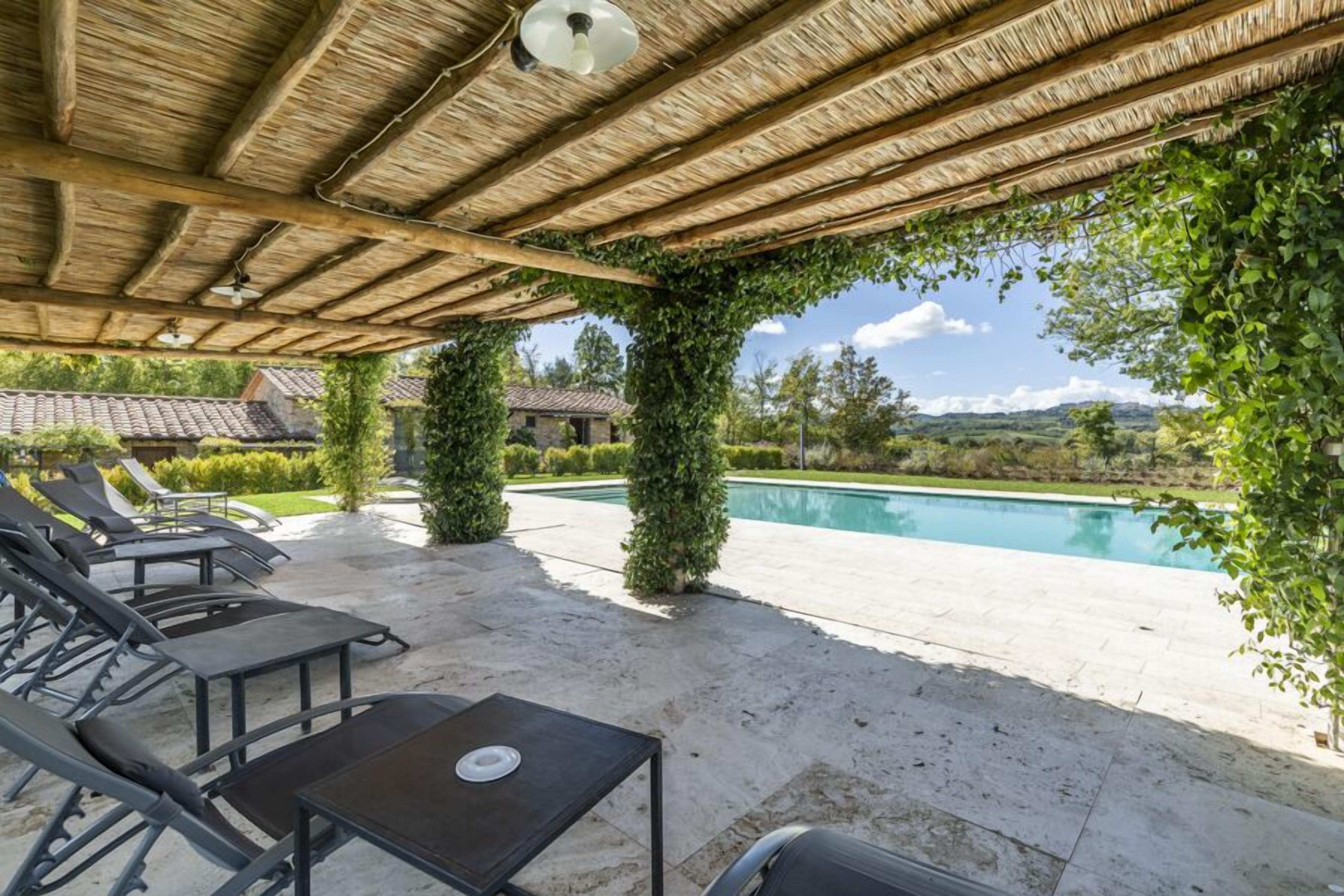 Seasonal outdoor pool, pool loungers