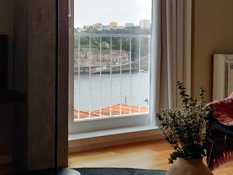 Apartment, 2 Bedrooms (Guindais) | Living area | Flat-screen TV