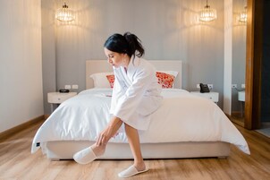 Egyptian cotton sheets, premium bedding, down duvets, Tempur-Pedic beds