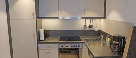 Fridge, oven, dishwasher, high chair