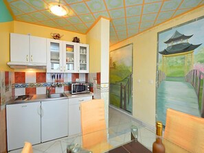 Fridge, microwave, cookware/dishes/utensils
