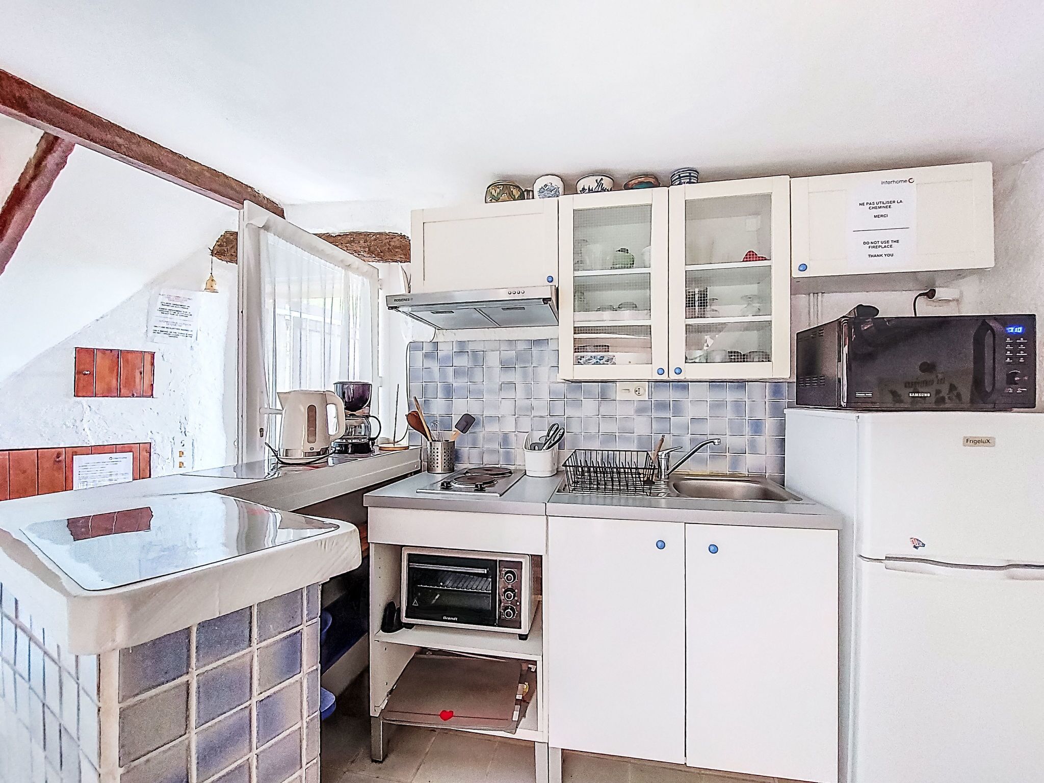 Fridge, microwave, toaster, cookware/dishes/utensils