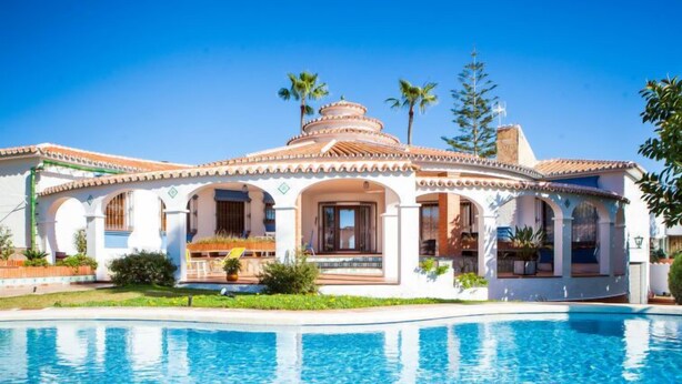 A Mediterranean-style villa with a swimming pool, featuring arched windows and a tiled roof. - Zurbarán by the Sea by Interhome (Rincón de la Victoria)