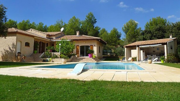 A villa with a swimming pool, outdoor seating, and a garden. - La Péguière by Interhome (La Cadière d'Azur)