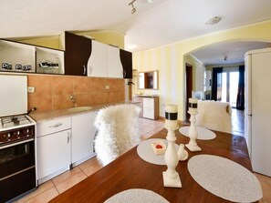 Fridge, oven, cookware/dishes/utensils