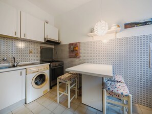 Fridge, microwave, oven, cookware/dishes/utensils