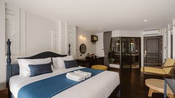 Quarto casal júnior, 1 cama King | Cortinas blackout, Wi-Fi de cortesia, roupa de cama
