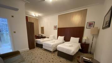 Standard Triple Room | Iron/ironing board, free WiFi, bed sheets