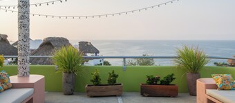 Colorful new home centrally located with breathtaking ocean and mountain views.