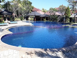 Outdoor pool, open 8:00 AM to 8:00 PM, sun loungers