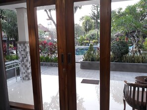 Deluxe Triple Room, Bathtub, Poolside | View from room