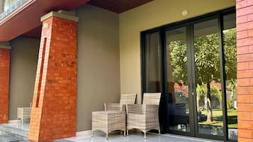 Quarto triplo superior, vista para o parque | Terraço/pátio