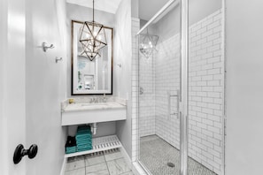 Bathtub, hair dryer, towels, soap