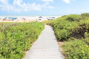 On the beach, sun-loungers, beach towels