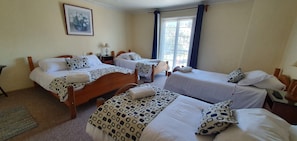 Hypo-allergenic bedding, down duvets, in-room safe, free WiFi