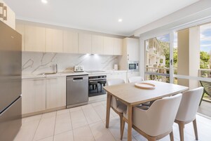 Standard Apartment, 1 Bedroom | Private kitchen | Full-size fridge, microwave, stovetop, cookware/dishes/utensils